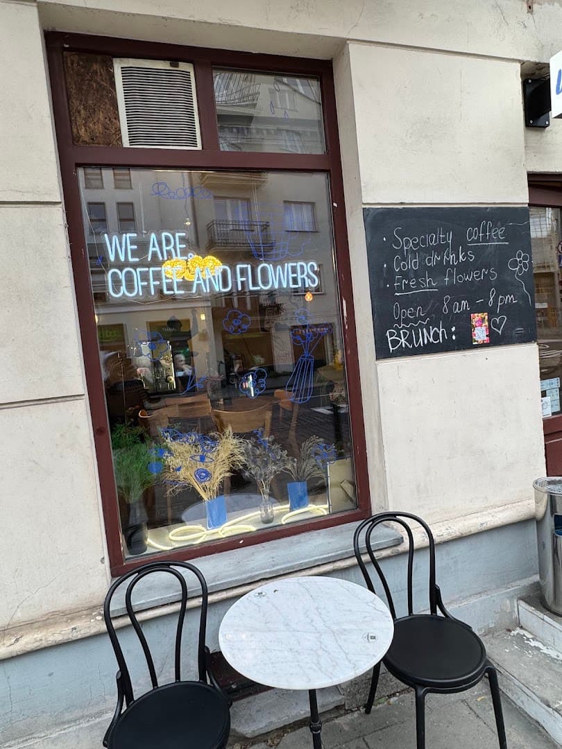 Storefront of We are. Coffee and Flowers, specialty coffee shop in Warsaw