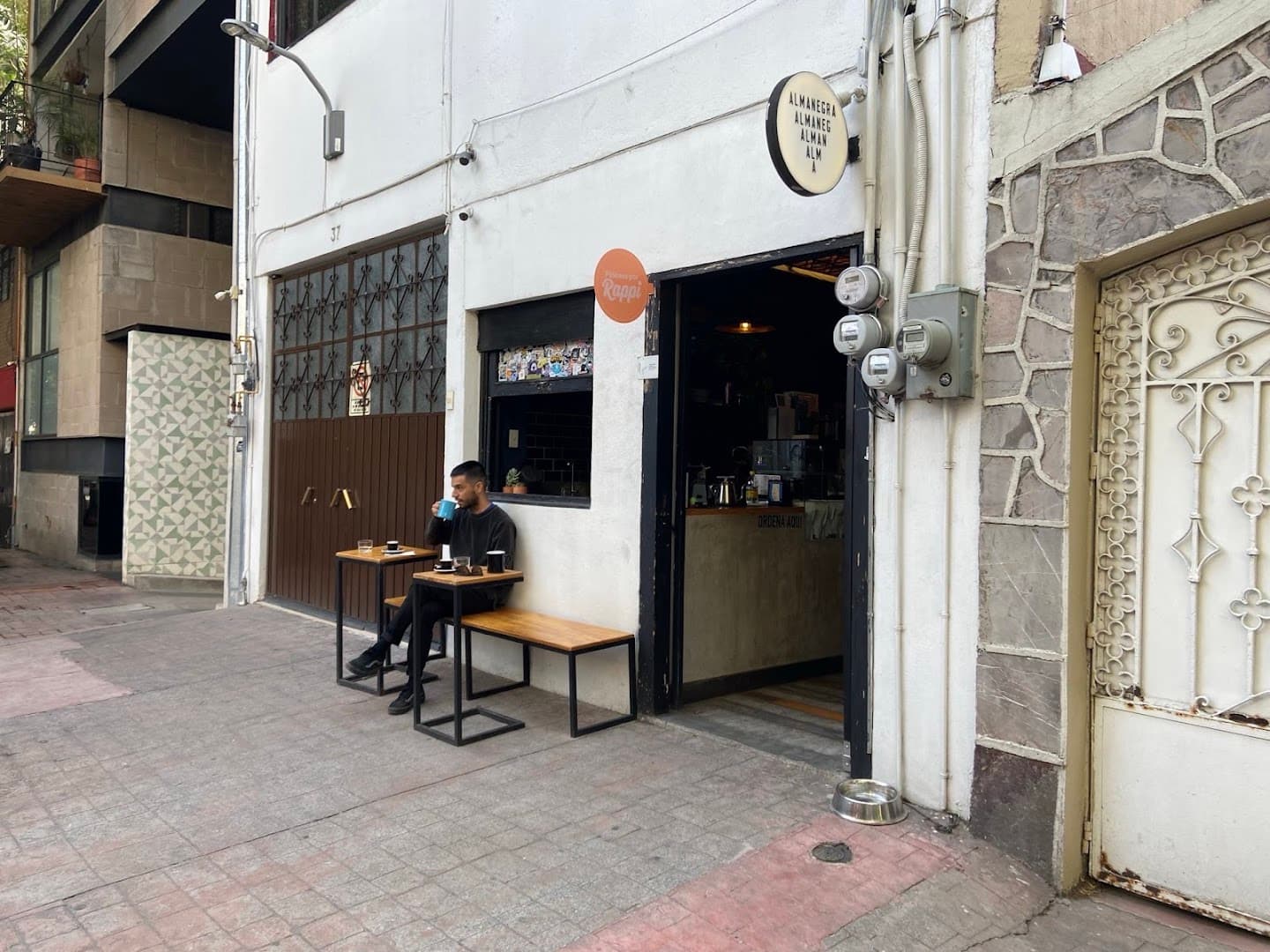 Storefront of Almanegra Café, specialty coffee shop in Mexico City