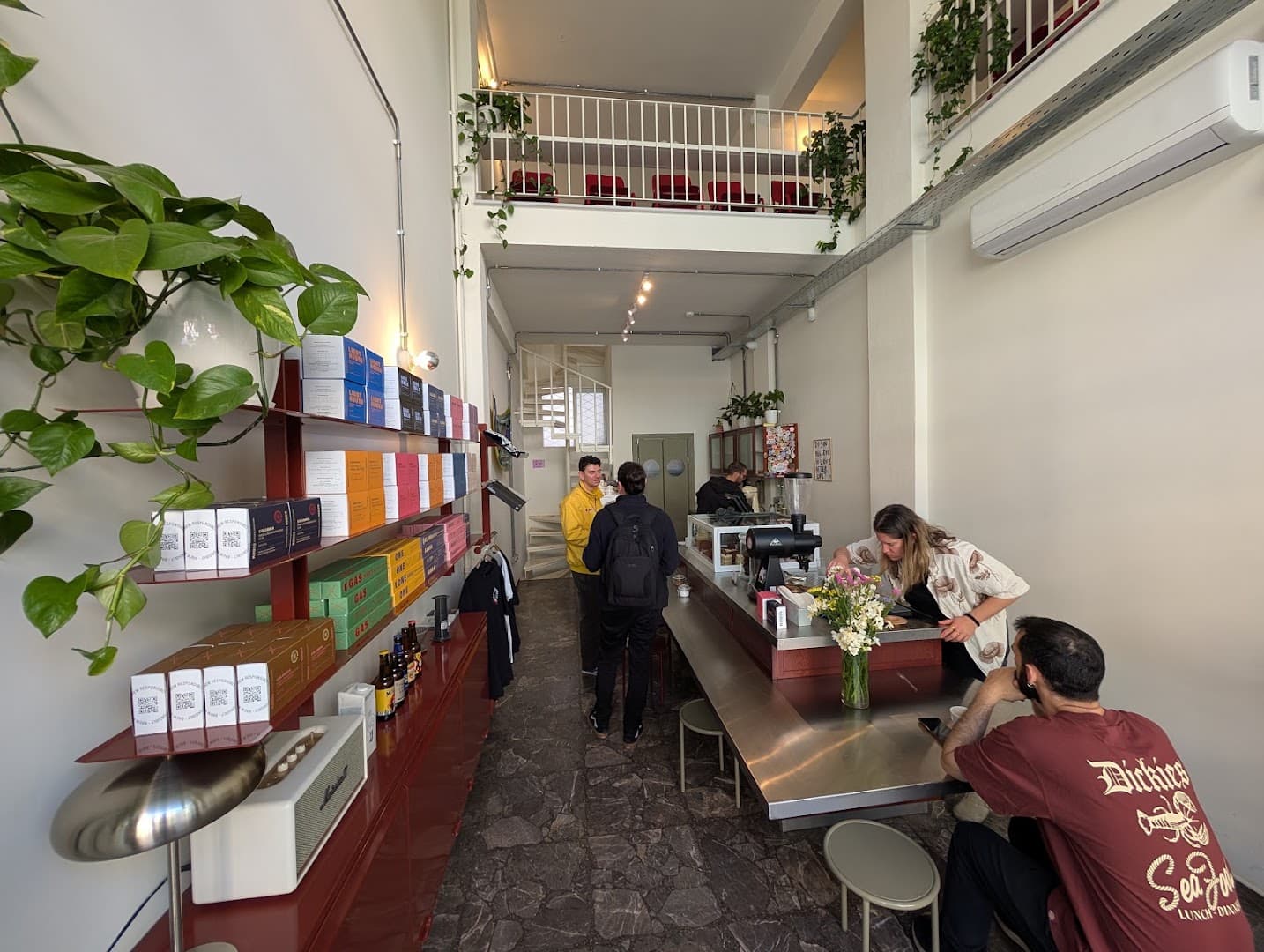 Interior of Kross Coffee Roasters Pagkrati, specialty coffee shop in Athens