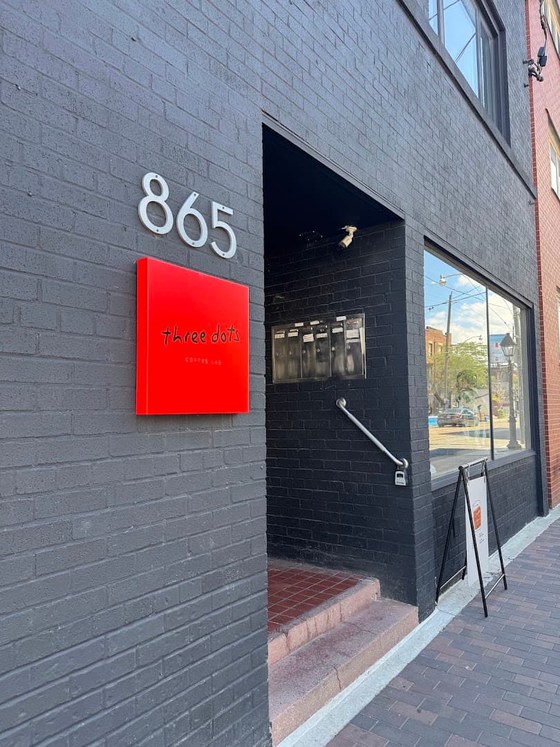 Storefront of Three Dots Coffee Lab, specialty coffee shop in Toronto