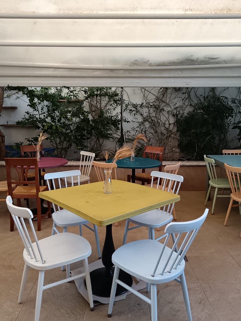 Interior of Hettaro Marconi bottega e mescite, specialty coffee shop in Rome