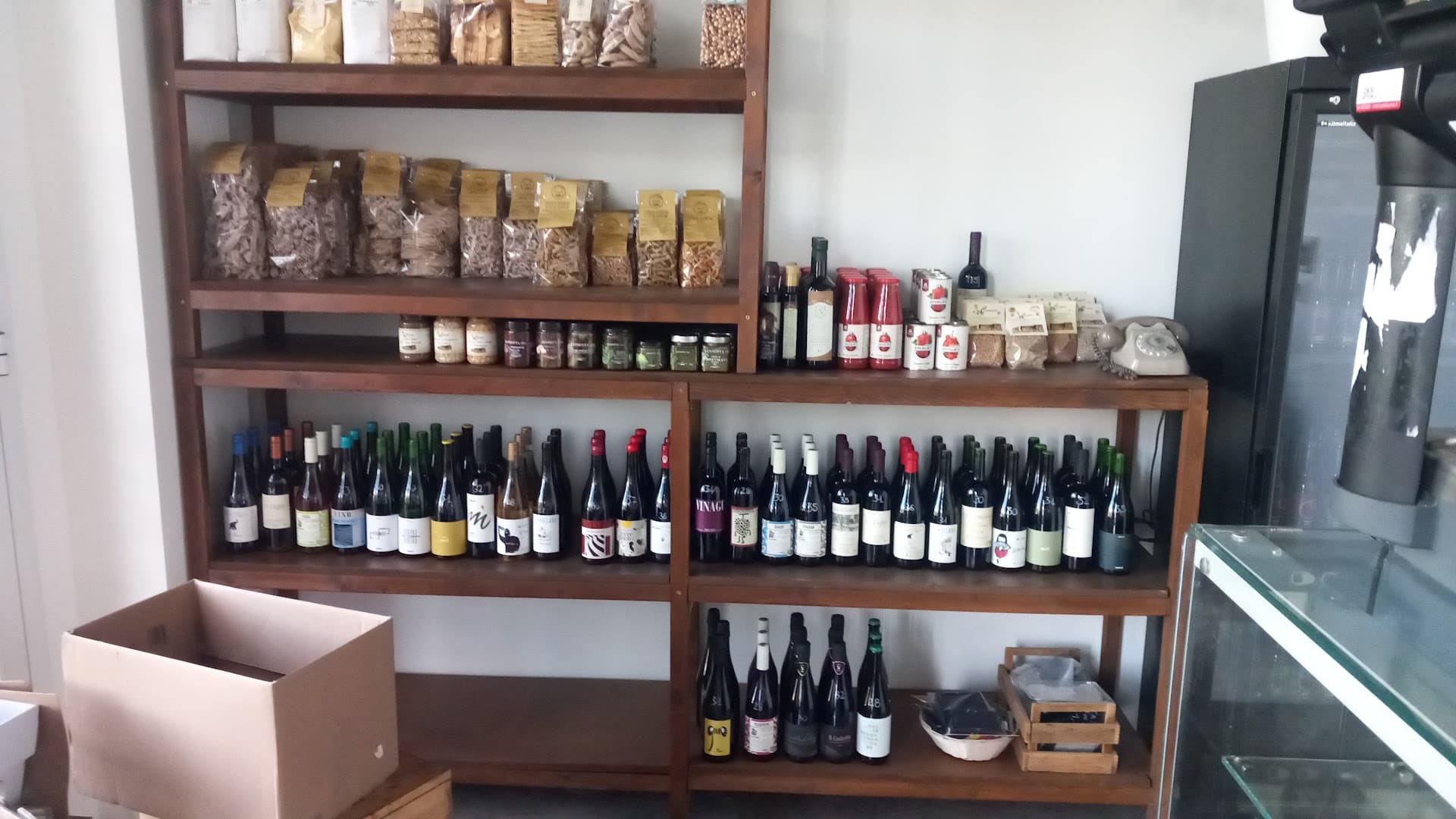 Interior of Hettaro Marconi bottega e mescite, specialty coffee shop in Rome