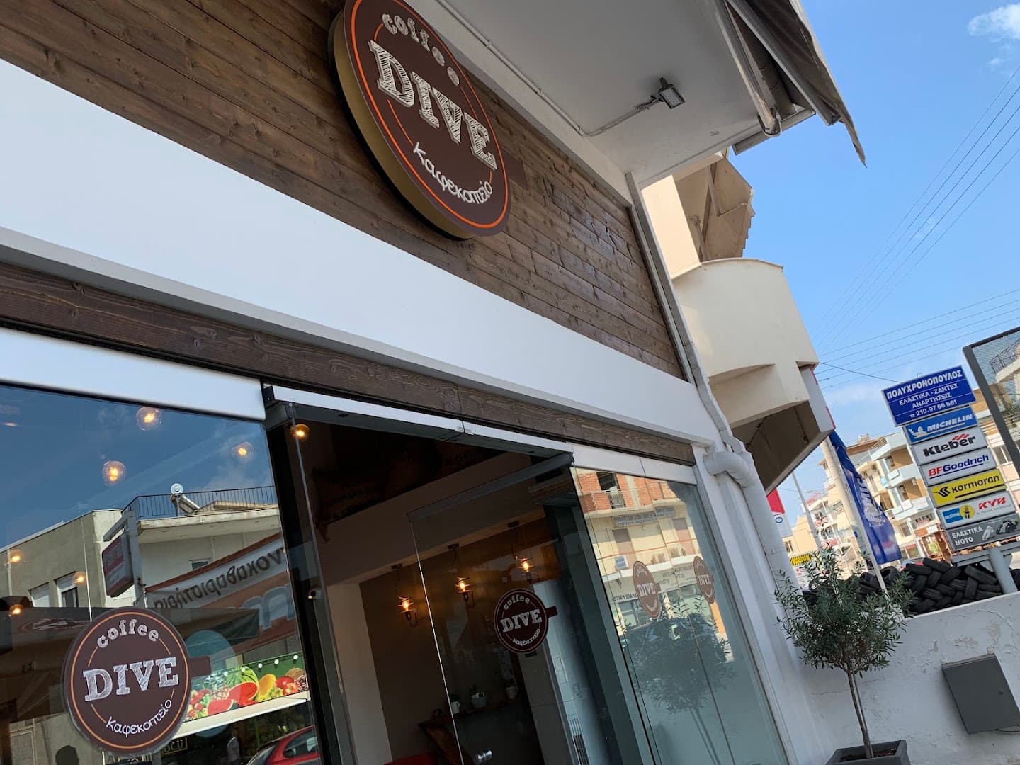 Storefront of Coffee Dive, specialty coffee shop in Athens