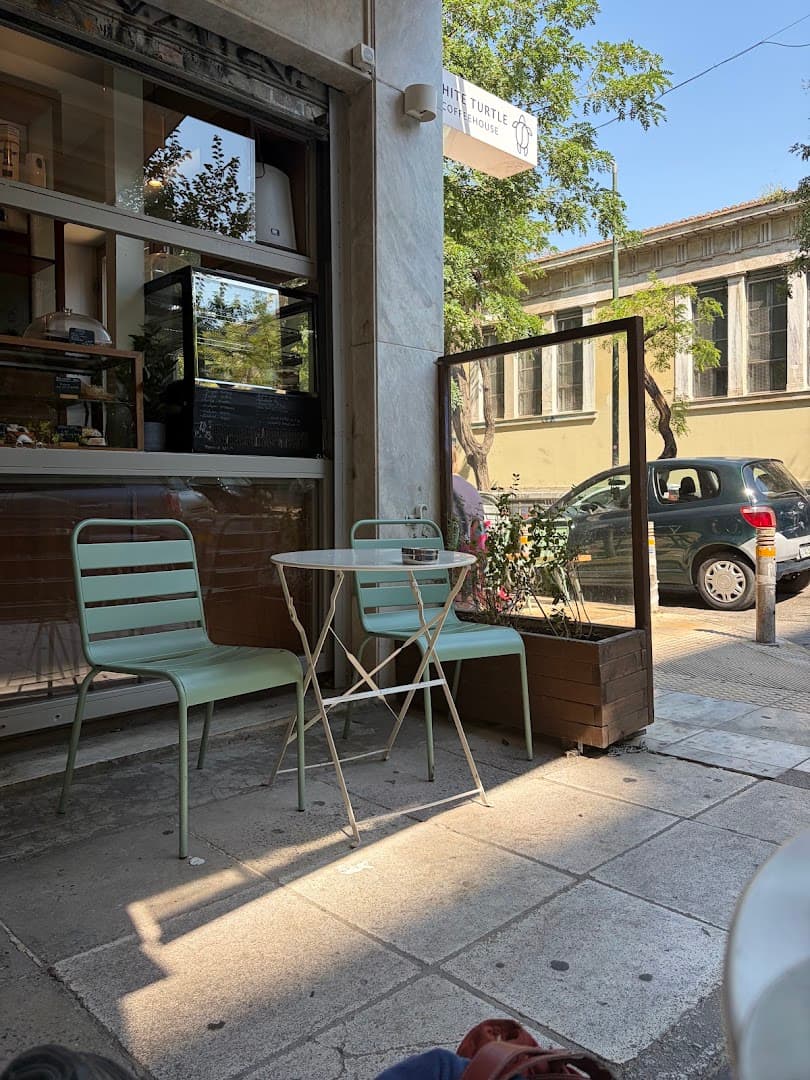 Storefront of White Turtle Coffeehouse, specialty coffee shop in Athens