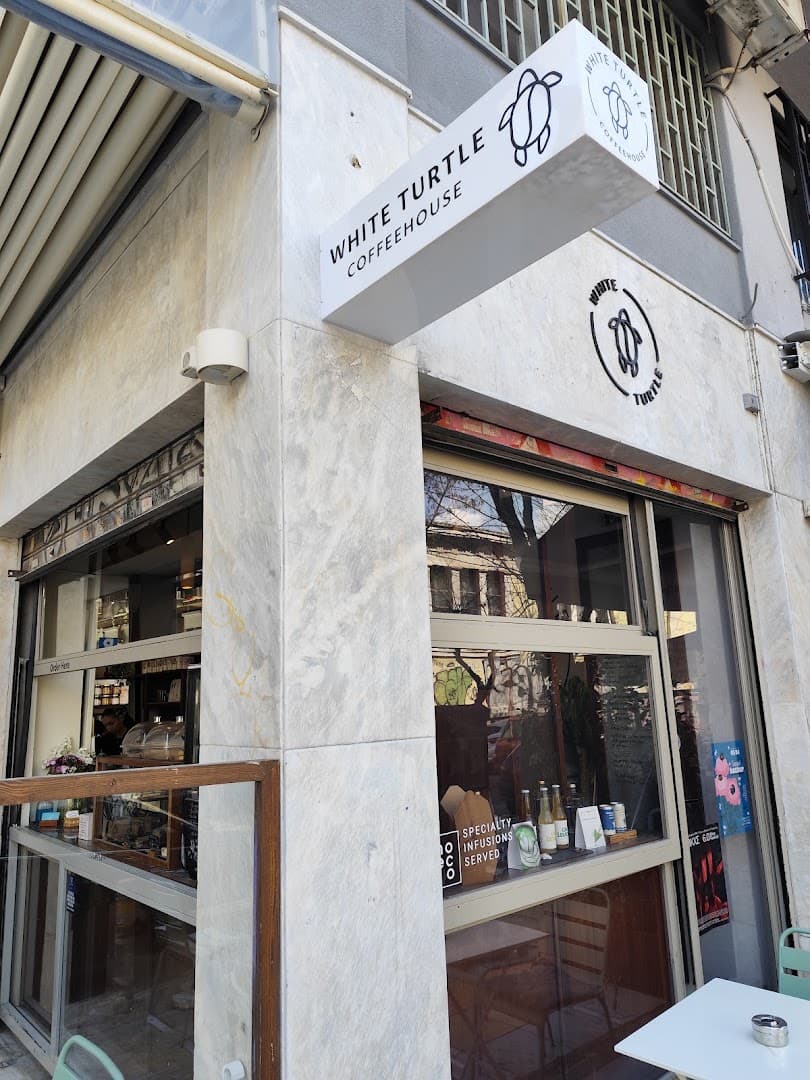 Storefront of White Turtle Coffeehouse, specialty coffee shop in Athens