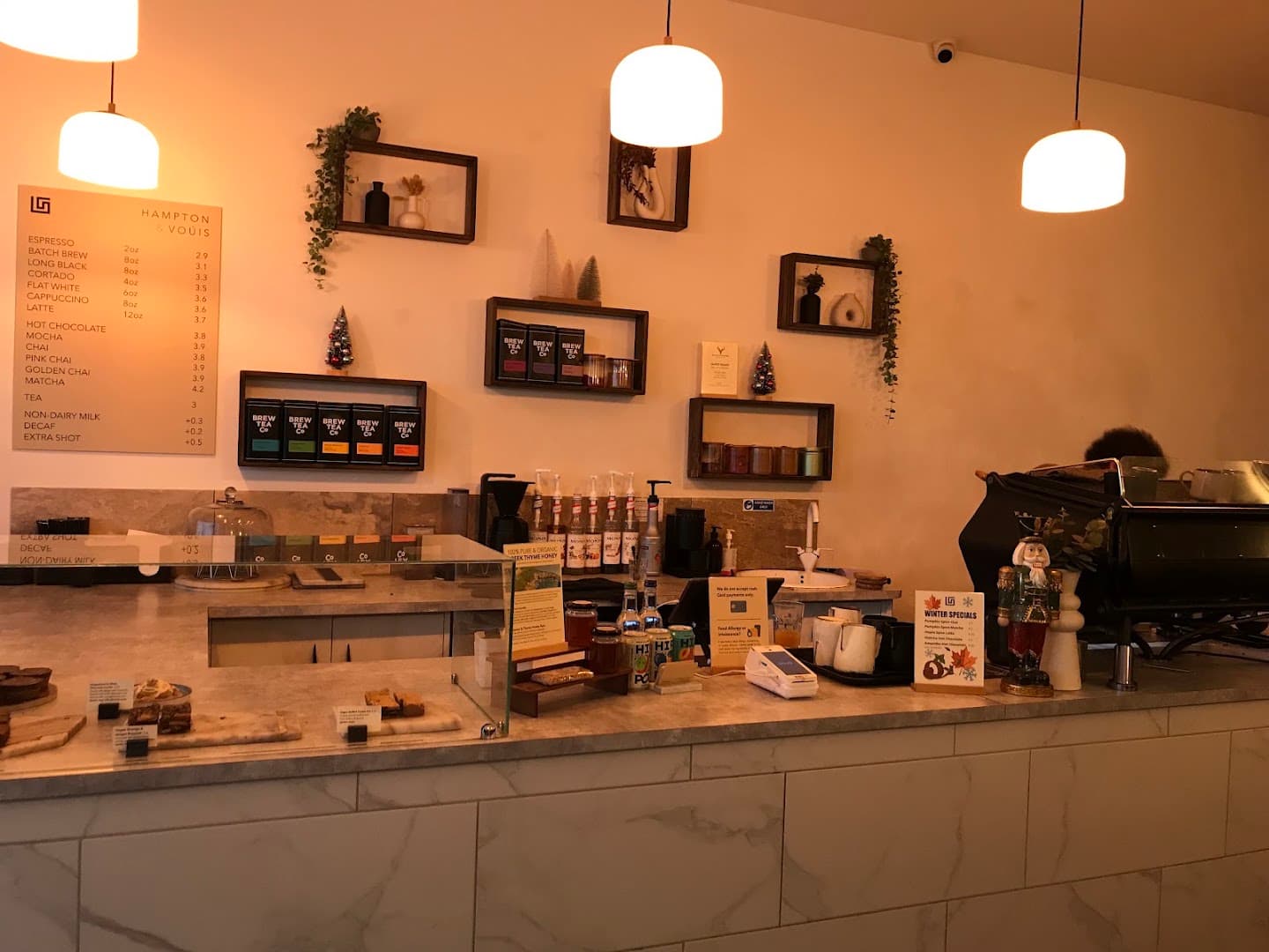 Interior of HAMPTON & VOÚIS, specialty coffee shop in Manchester