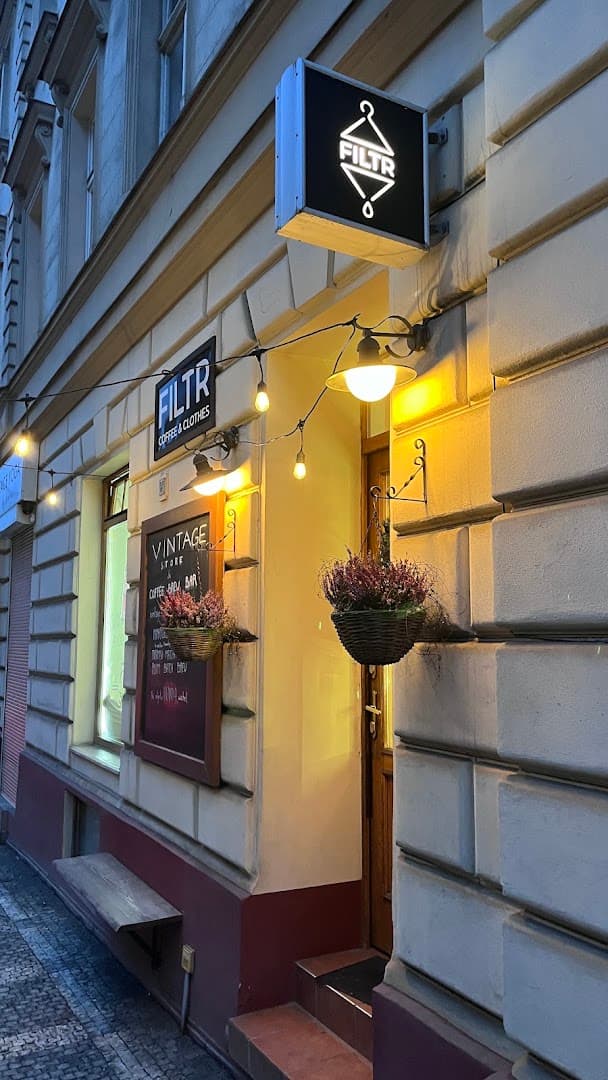 Storefront of FILTR Coffee & Clothes, specialty coffee shop in Prague