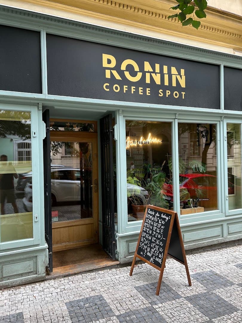 Storefront of RONIN Coffee Spot, specialty coffee shop in Prague