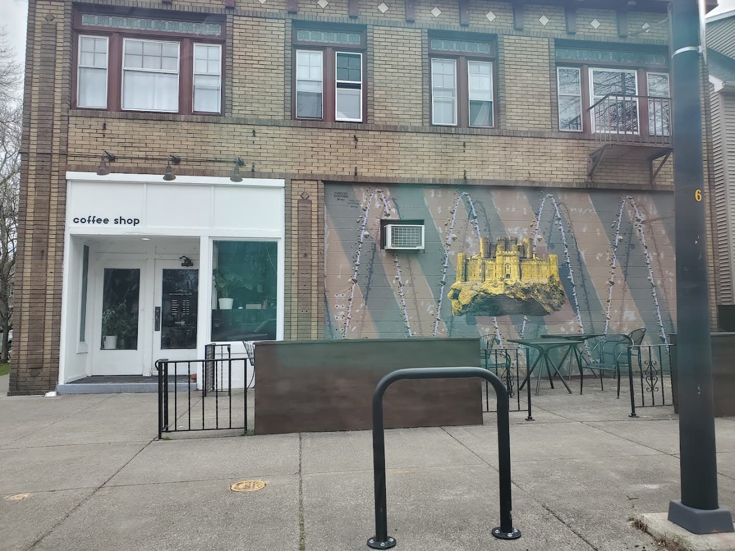 Storefront of Montgomery Court, specialty coffee shop in Rochester