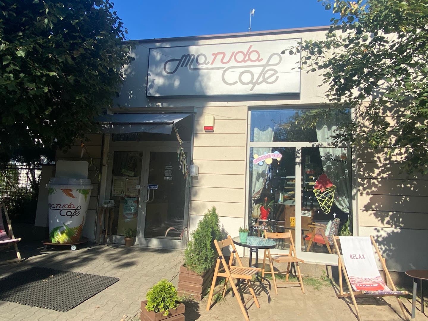 Storefront of Maruda Cafe, specialty coffee shop in Warsaw