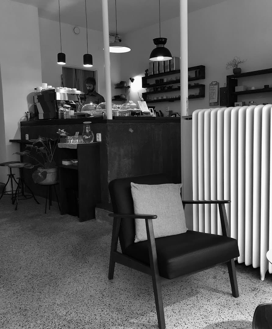 Interior of Café Tout va bien, specialty coffee shop in Prague