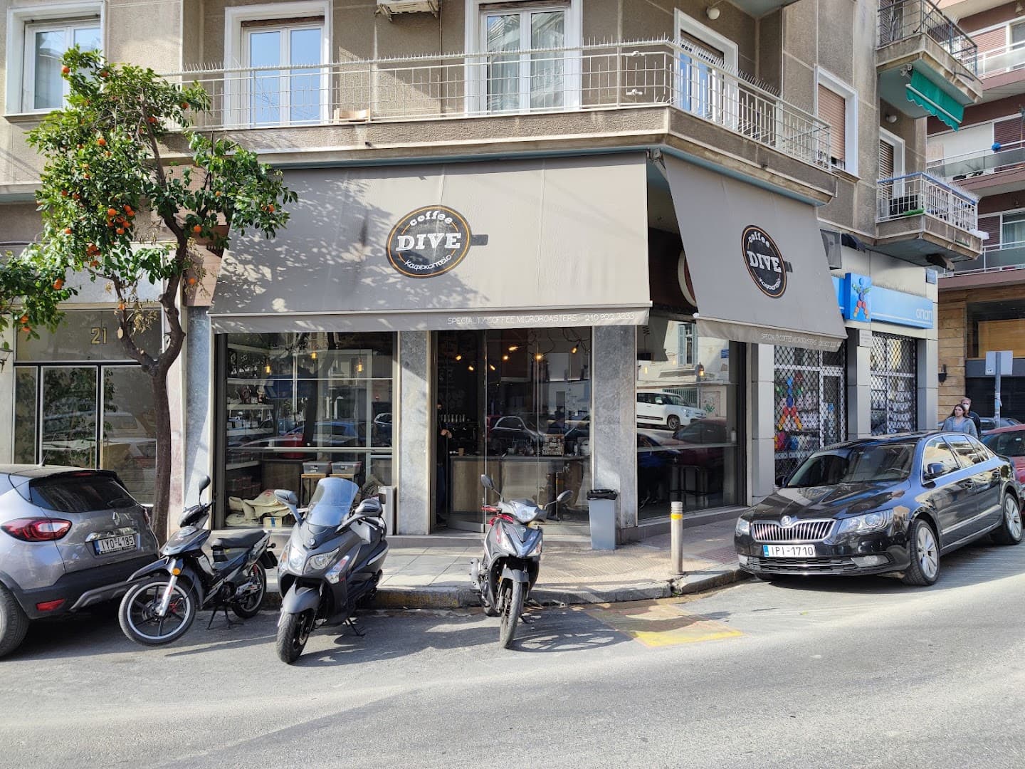 Storefront of Coffee Dive Acropolis, specialty coffee shop in Athens