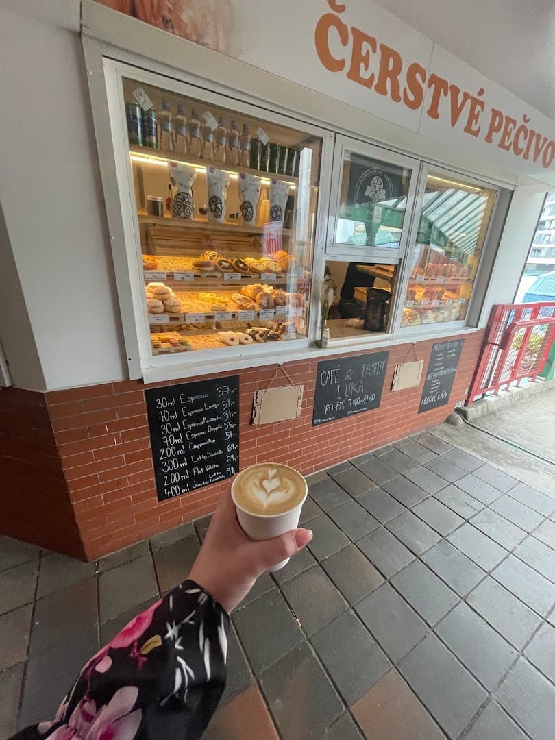 Storefront of cafe_pastry_luka, specialty coffee shop in Prague