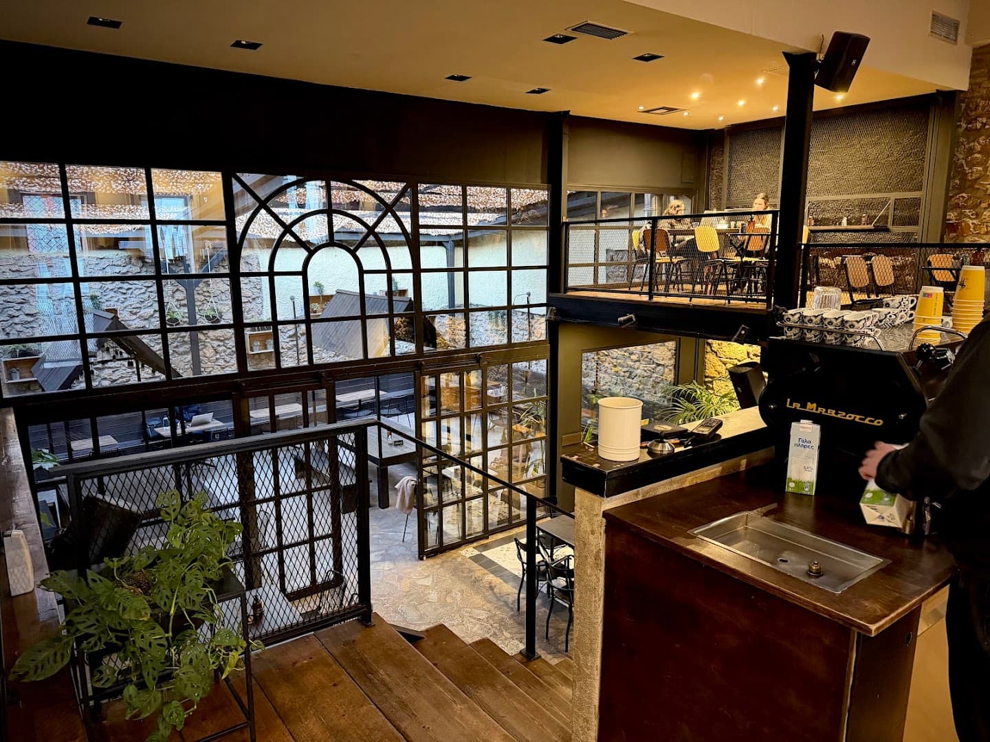 Interior of The Underdog Thissio, specialty coffee shop in Athens