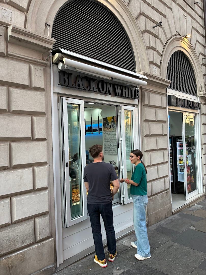 Storefront of Black on White-Bar Roma, specialty coffee shop in Rome