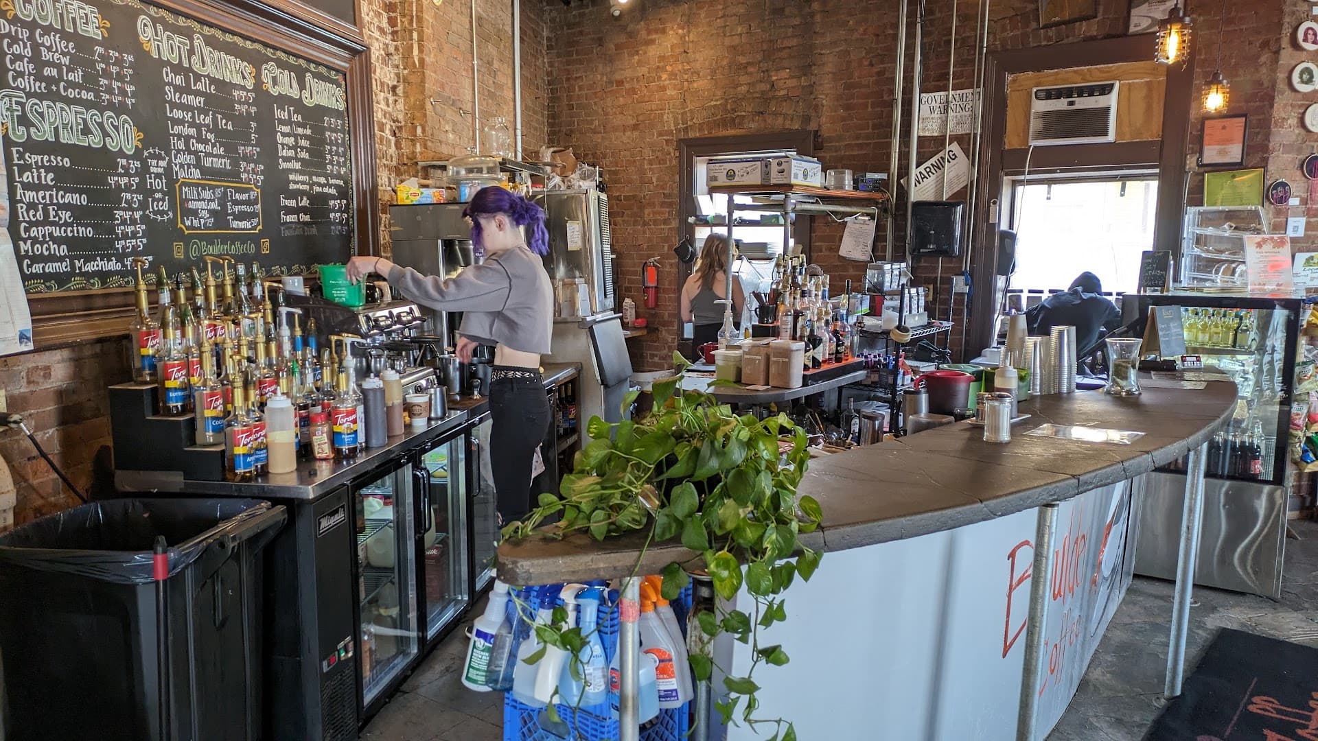 Interior of Boulder Coffee Co Cafe and Lounge, specialty coffee shop in Rochester