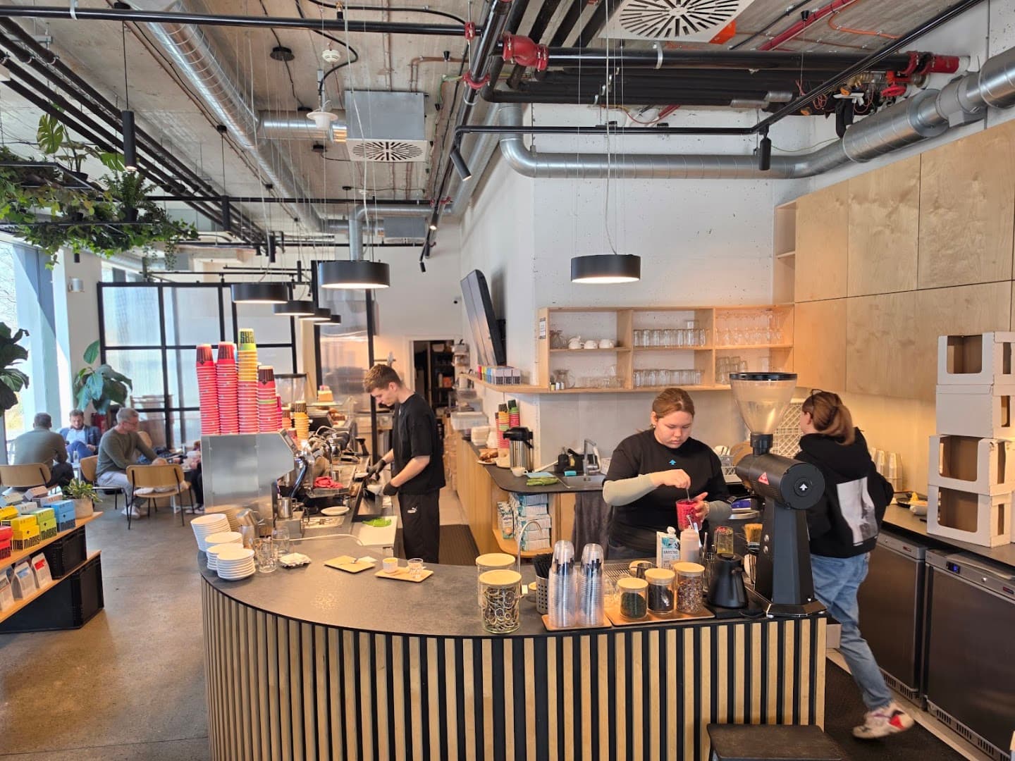 Interior of The Miners Coffee Churchill, specialty coffee shop in Prague