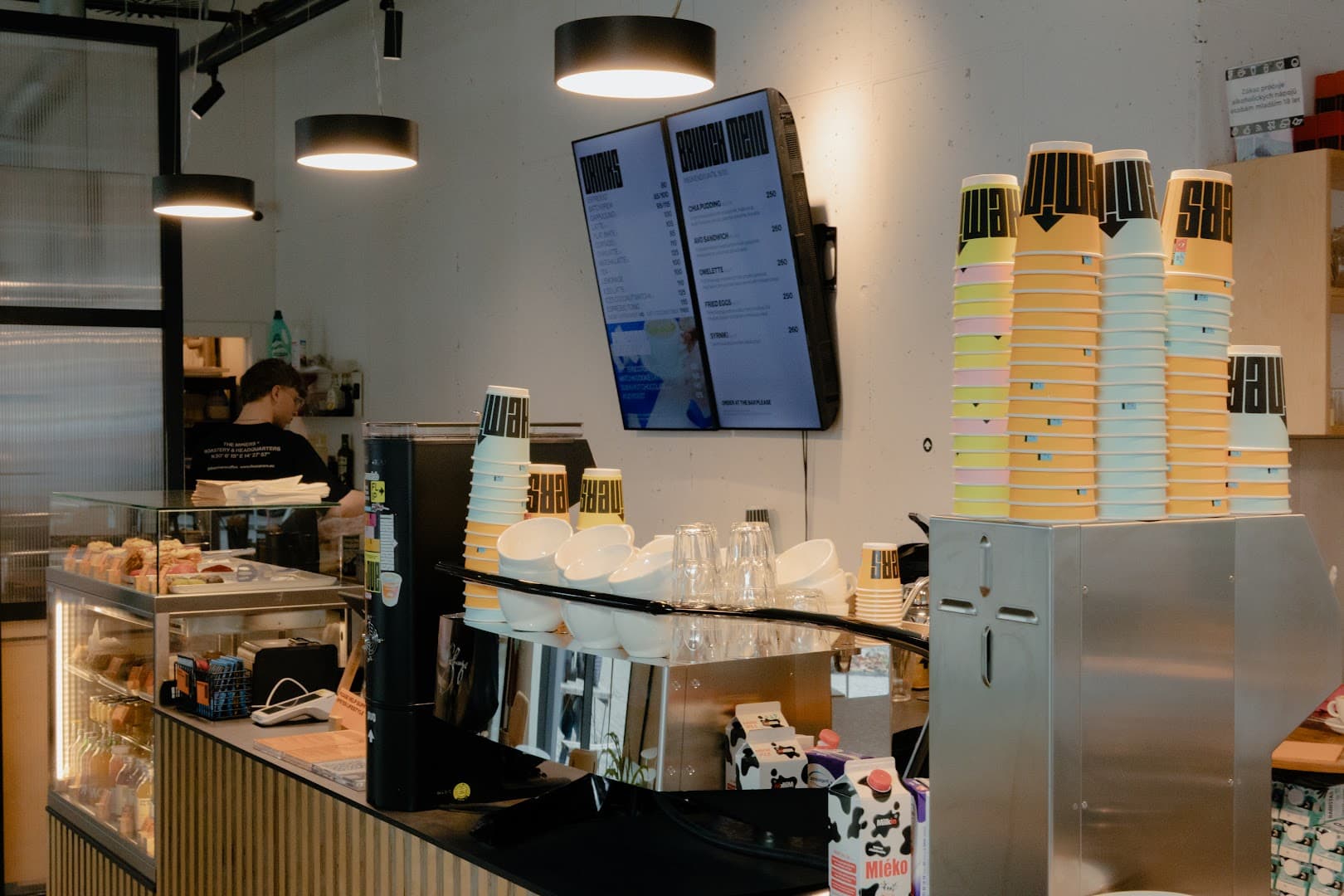 Interior of The Miners Coffee Churchill, specialty coffee shop in Prague