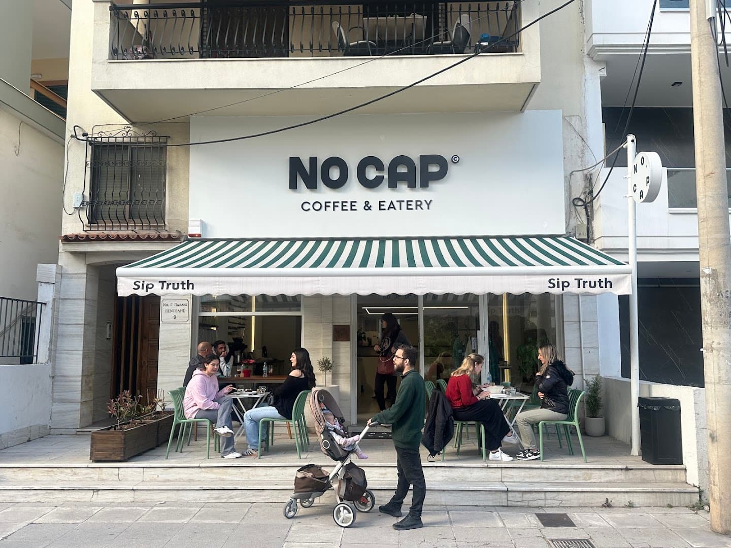 Storefront of No Cap coffee & eatery, specialty coffee shop in Athens