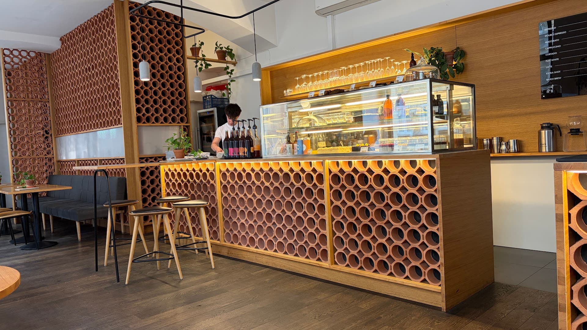 Interior of TYPIKA Nusle, specialty coffee shop in Prague
