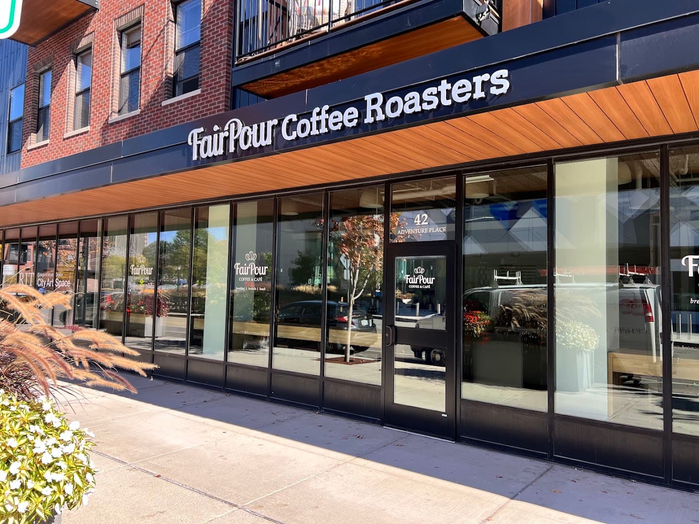Storefront of FairPour Coffee Roasters, specialty coffee shop in Rochester