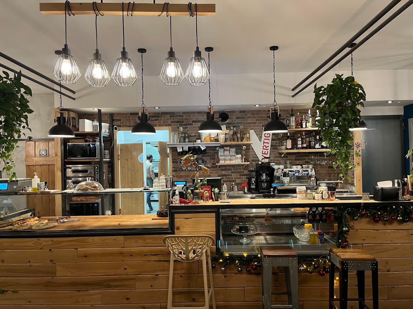 Interior of RADICI Social Food, specialty coffee shop in Rome