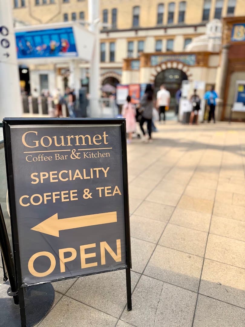 Storefront of Gourmet Coffee Bar & Kitchen, specialty coffee shop in Manchester