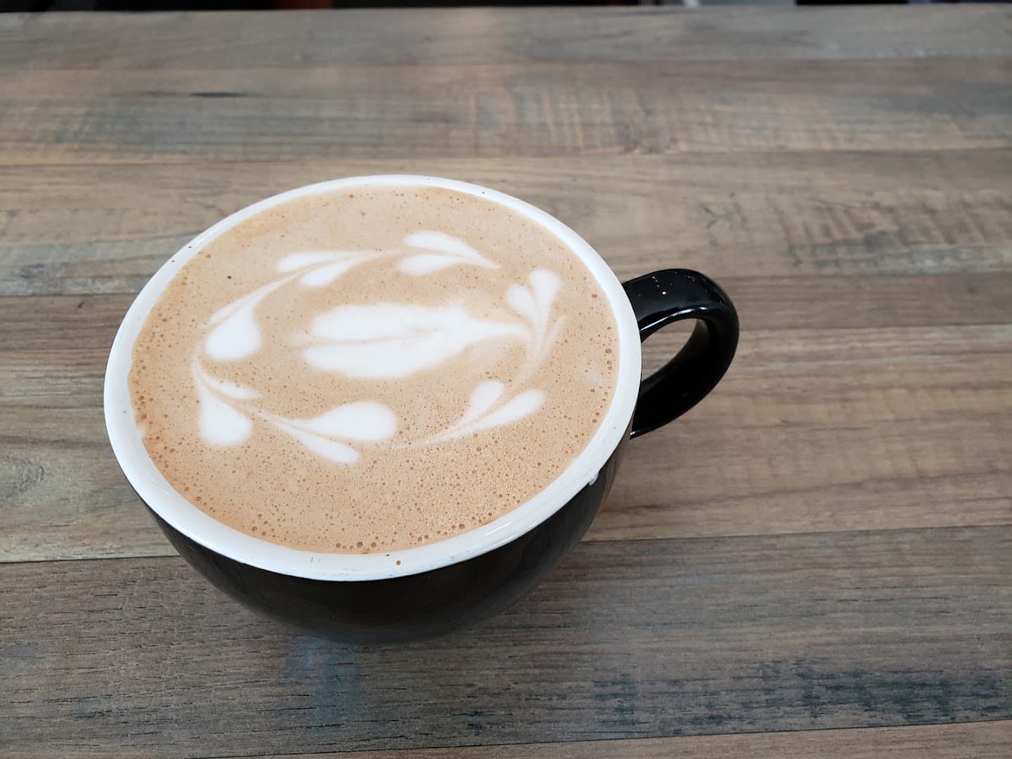 Coffee at Sisters' Sludge Coffee Cafe and Wine Bar, specialty coffee shop in Minneapolis