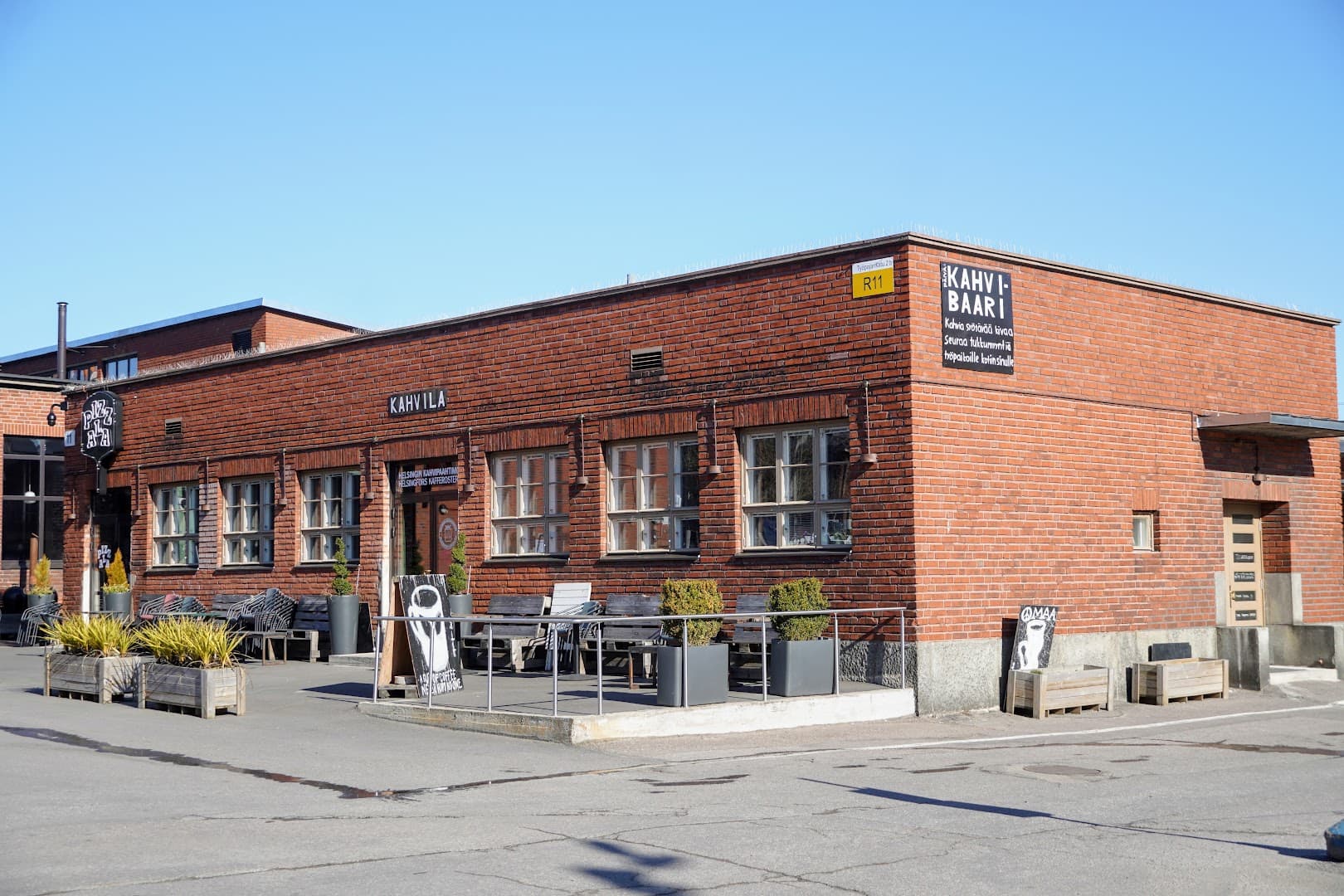 Storefront of Helsingin Kahvipaahtimon Päiväkahvibaari Teurastamo, specialty coffee shop in Helsinki