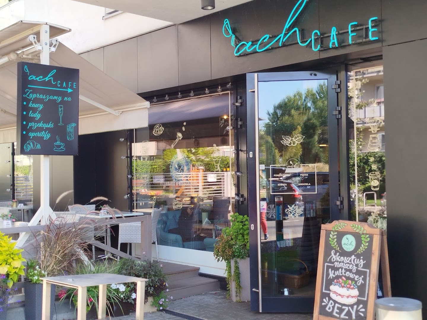 Storefront of Ach Cafe, specialty coffee shop in Warsaw