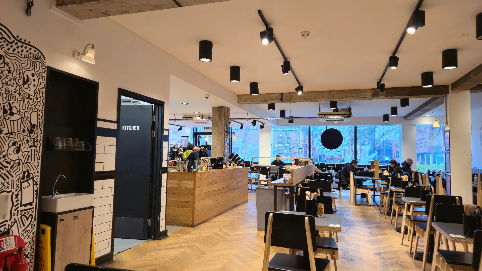 Interior of Bold Street Coffee University Green, specialty coffee shop in Manchester
