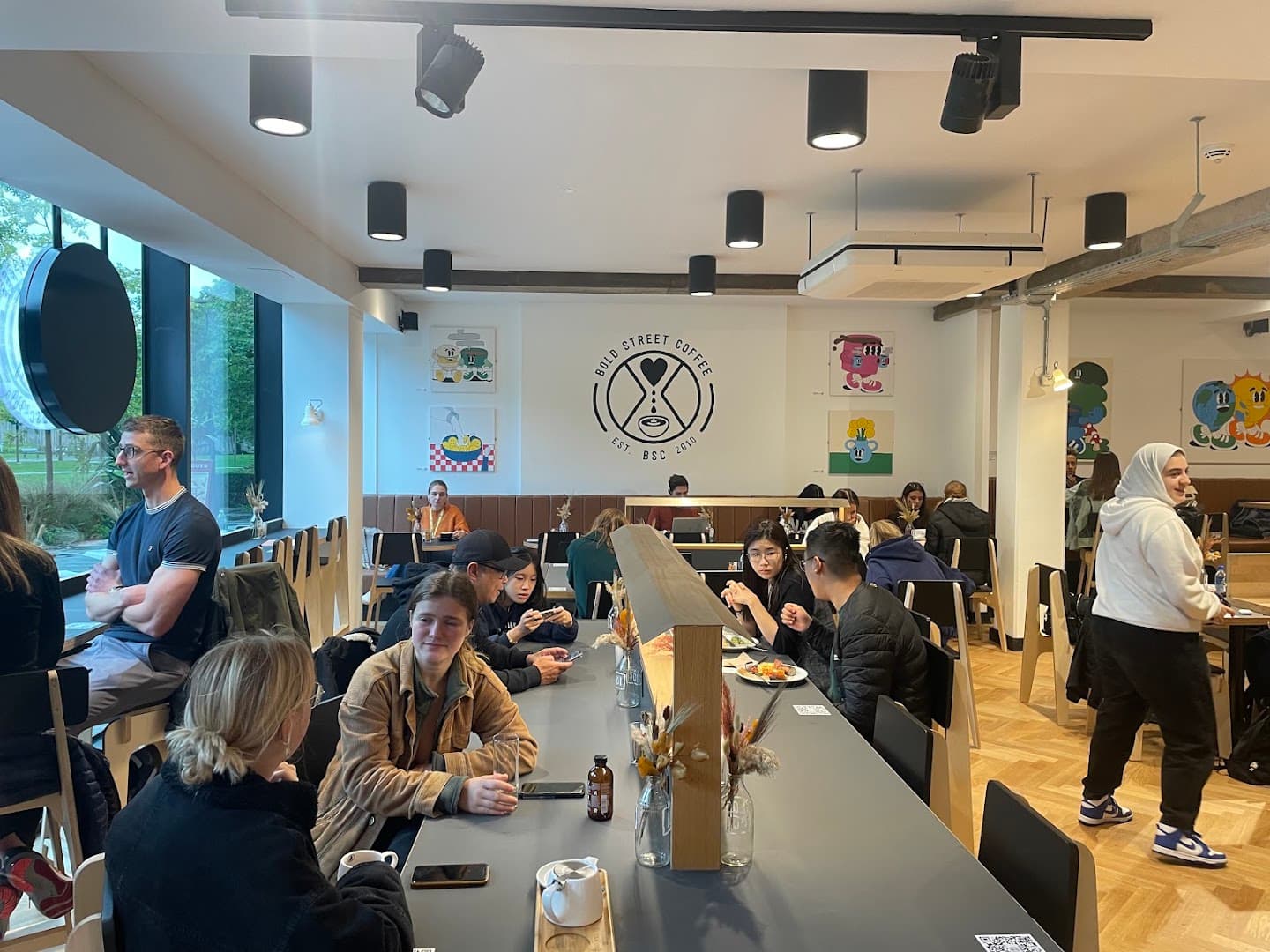 Interior of Bold Street Coffee University Green, specialty coffee shop in Manchester