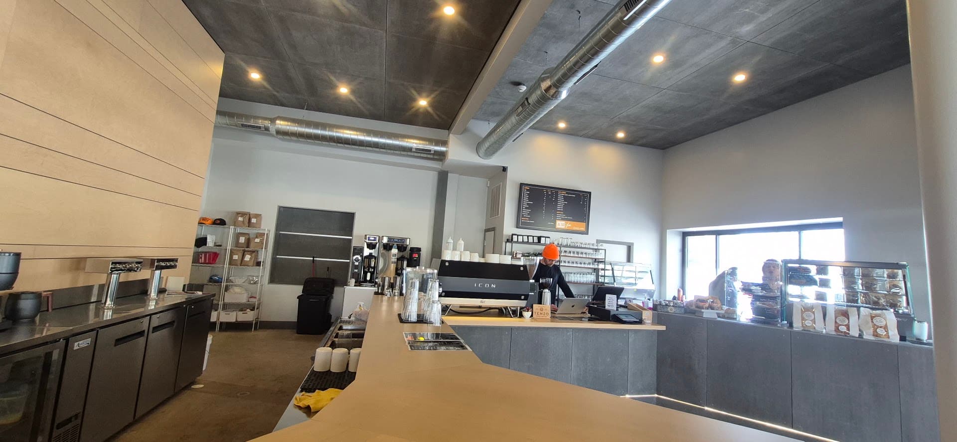Interior of AM:FM Creekside, specialty coffee shop in Rochester