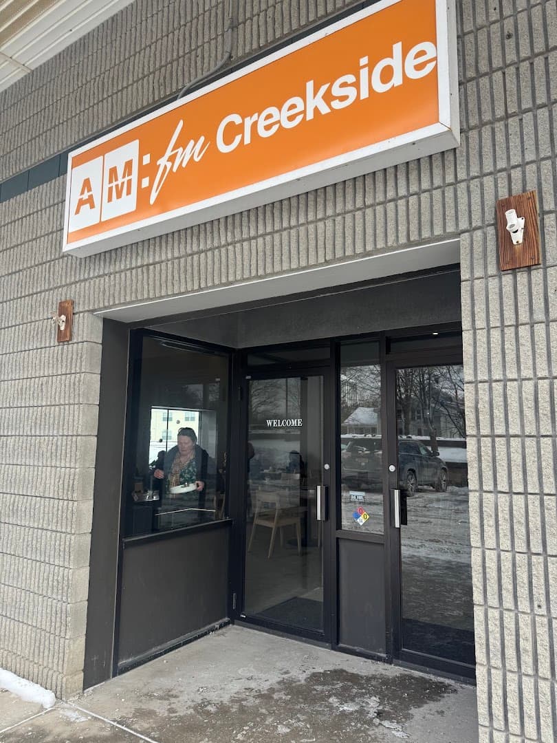 Storefront of AM:FM Creekside, specialty coffee shop in Rochester