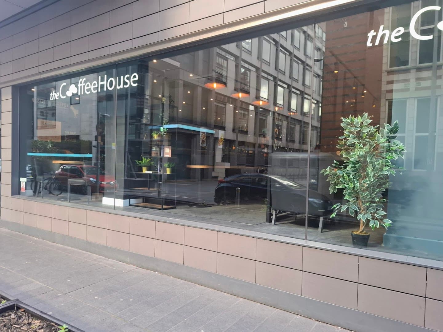 Storefront of Coffee House City Tower, specialty coffee shop in Manchester