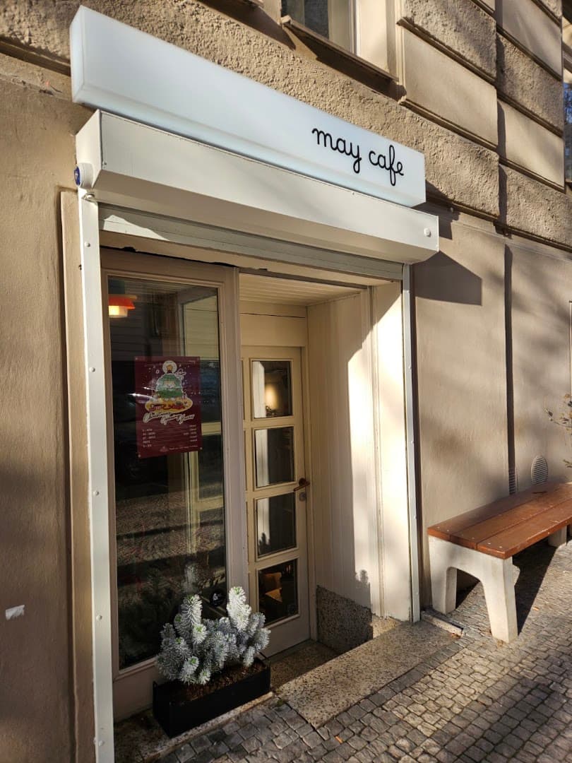 Storefront of may cafe, specialty coffee shop in Prague