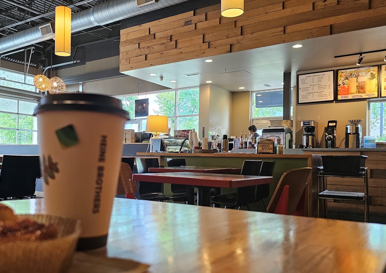 Interior of Heine Brothers Coffee - Blankenbaker, specialty coffee shop in Louisville