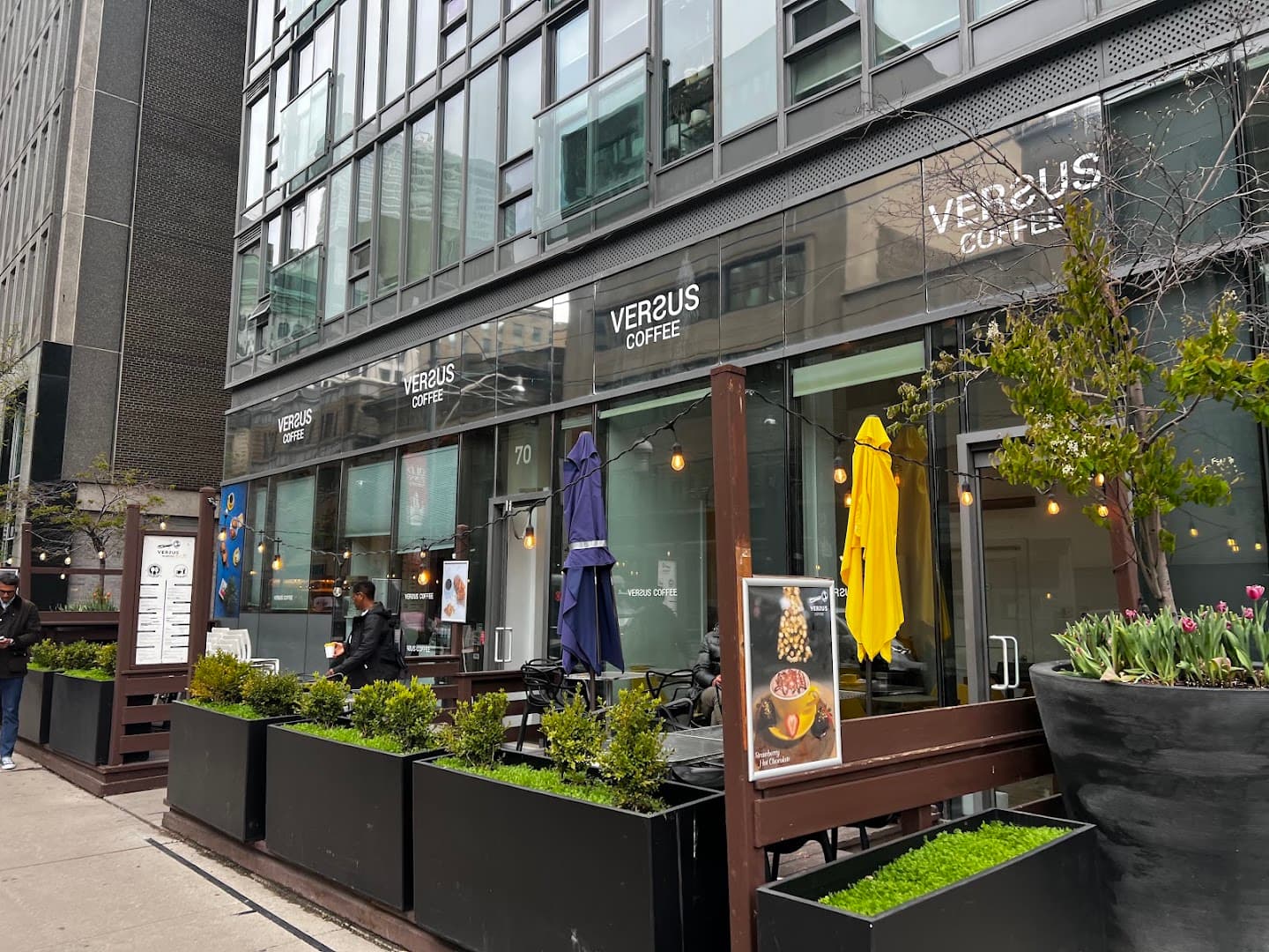 Storefront of Versus Coffee, specialty coffee shop in Toronto