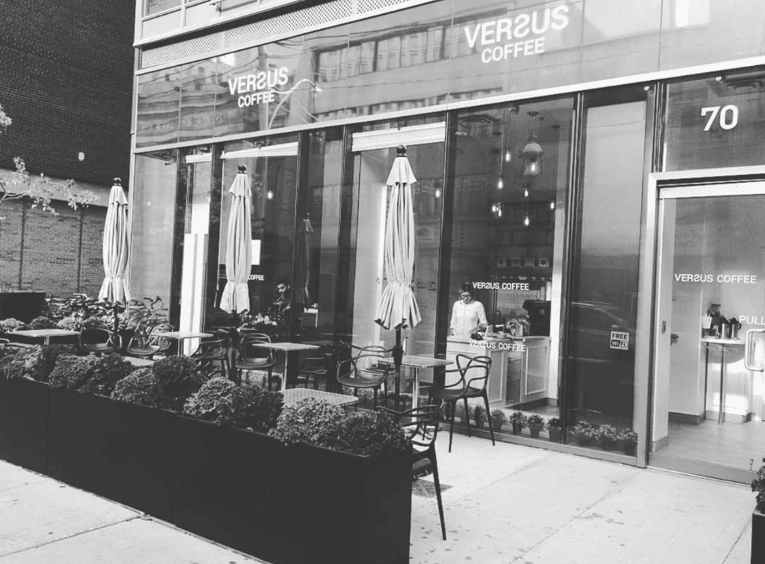 Storefront of Versus Coffee, specialty coffee shop in Toronto