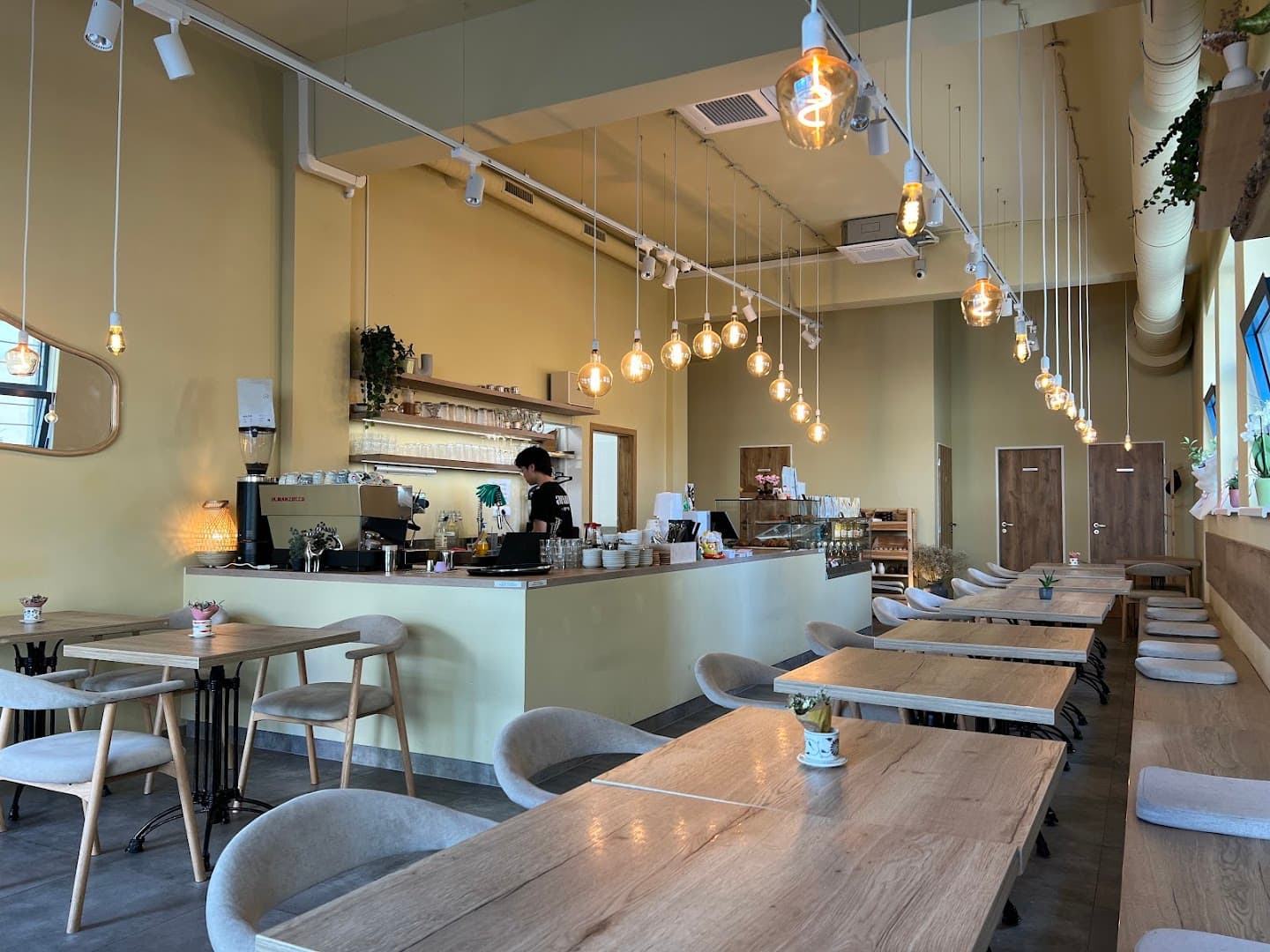 Interior of anmi cafe, specialty coffee shop in Prague