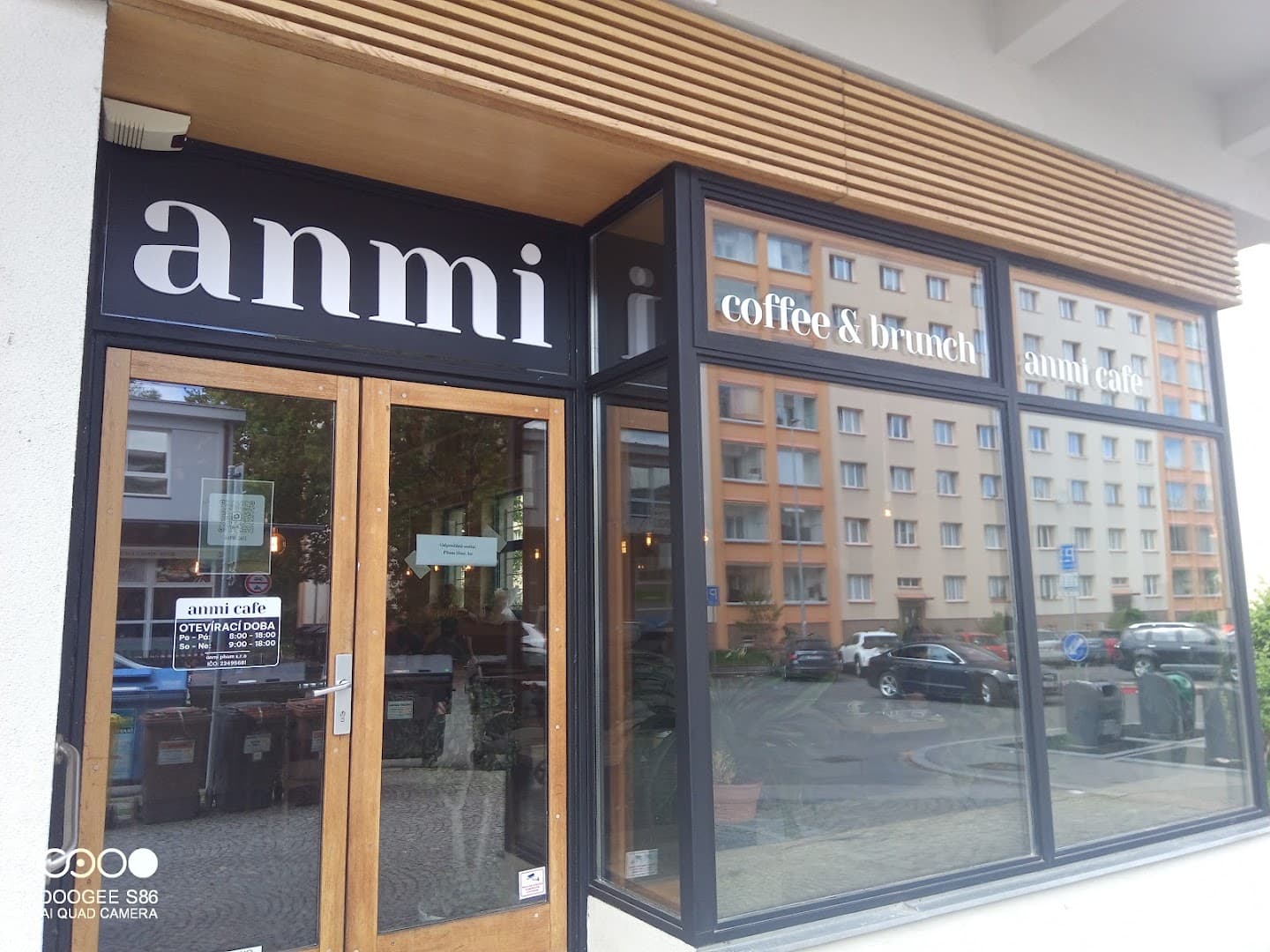 Storefront of anmi cafe, specialty coffee shop in Prague