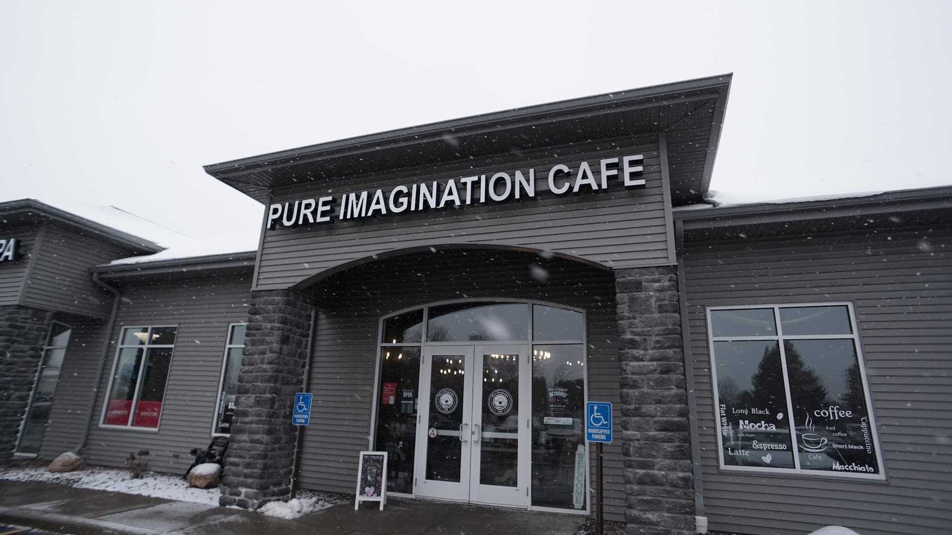 Storefront of Pure Imagination Cafe, specialty coffee shop in Rochester