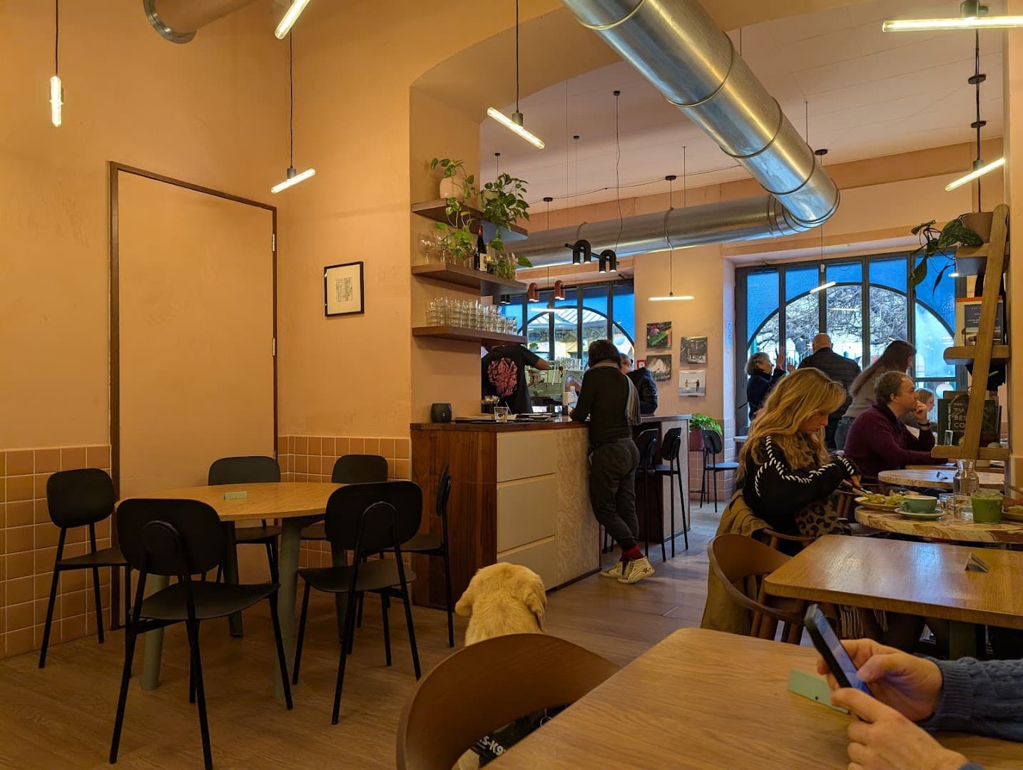Interior of NOWHERE - CAFE, specialty coffee shop in Milan