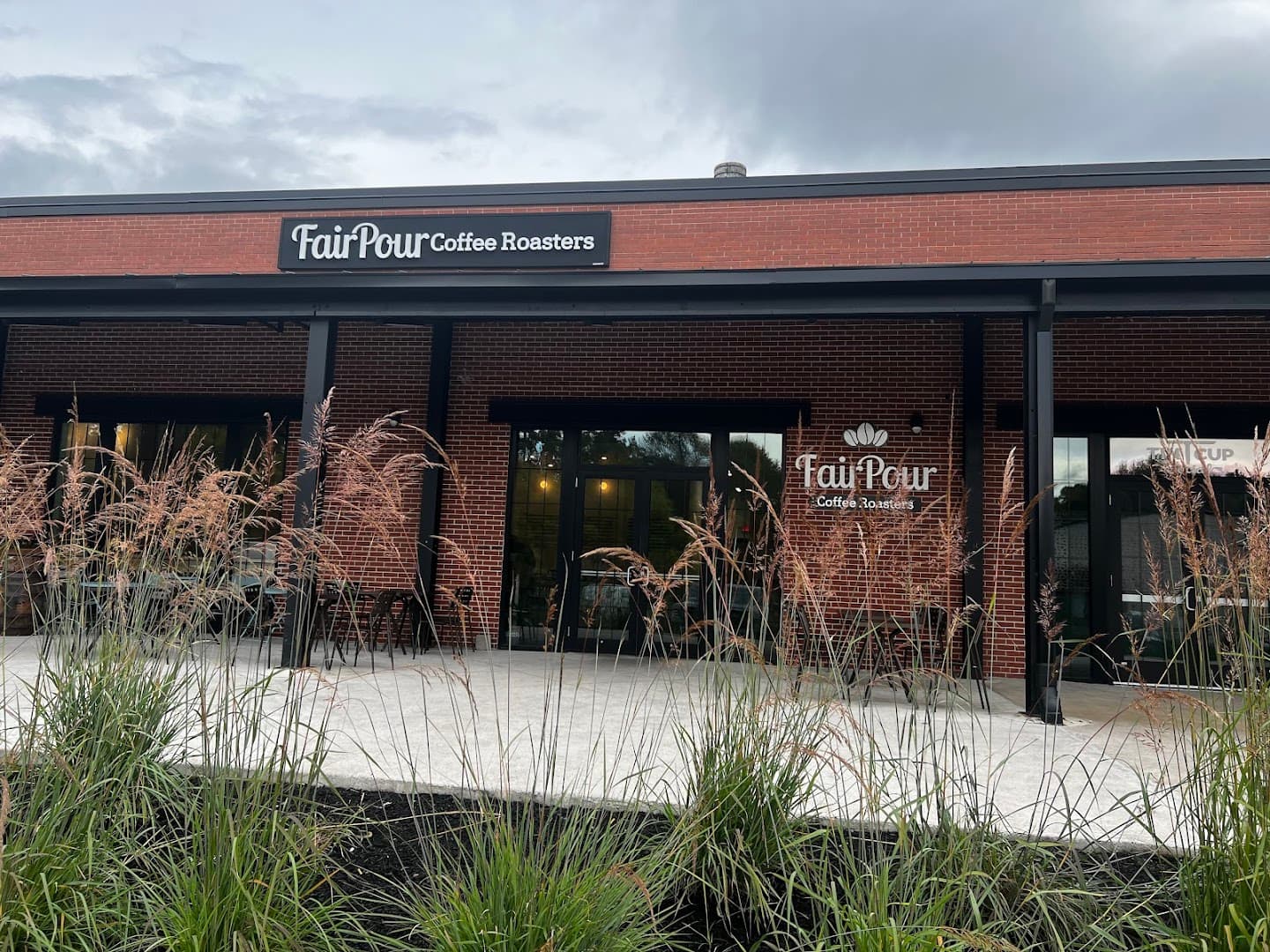 Storefront of FairPour Coffee Roasters, specialty coffee shop in Rochester
