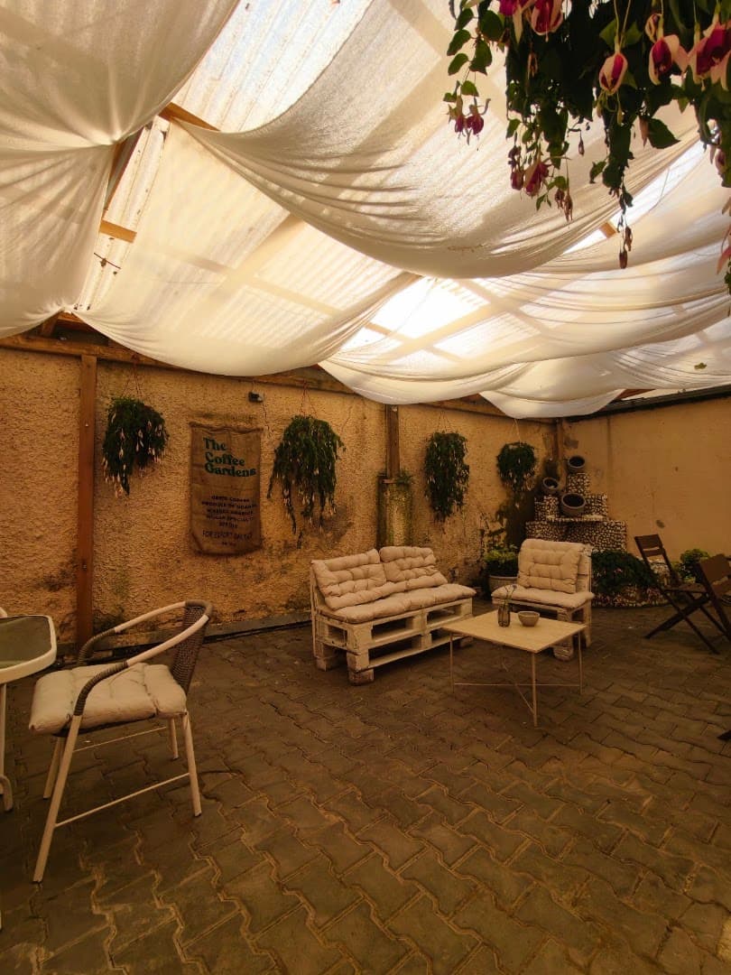 Storefront of ANWI cafe, specialty coffee shop in Prague