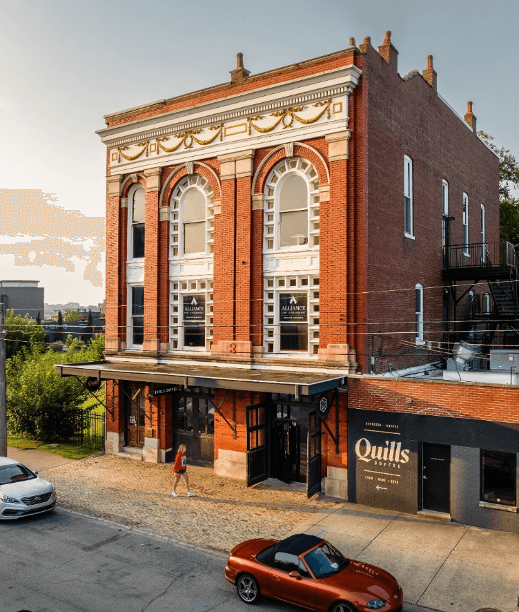 Storefront of Quills Coffee, specialty coffee shop in Louisville