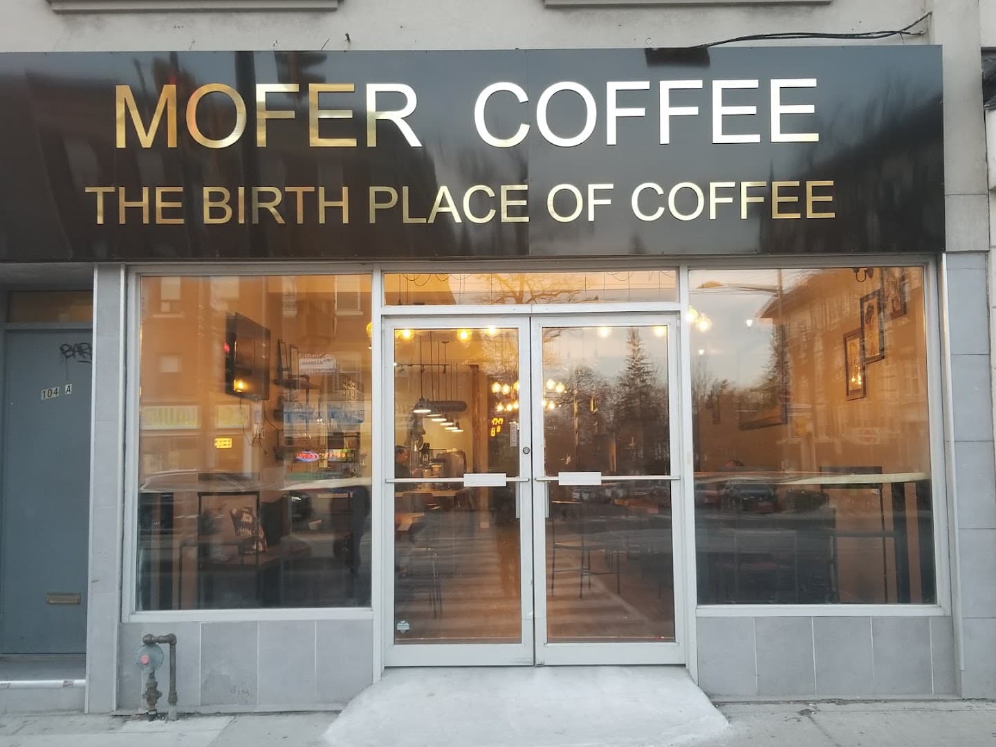 Storefront of Mofer Coffee St. Clair, specialty coffee shop in Toronto
