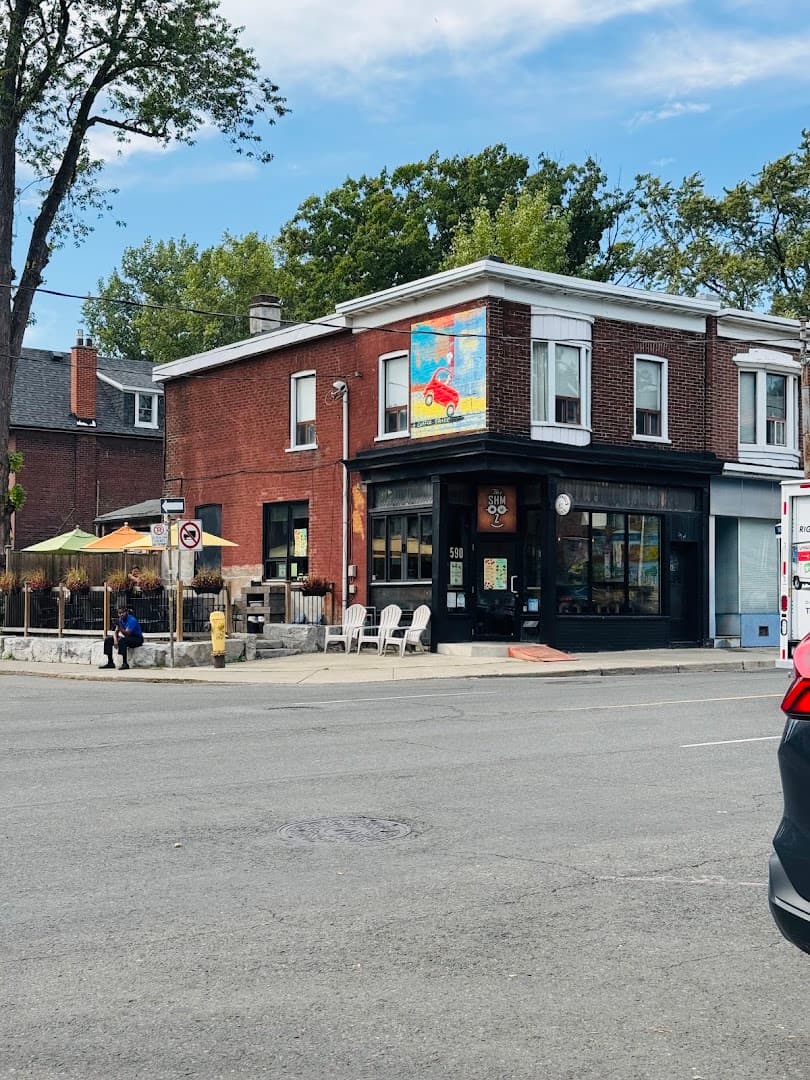 Storefront of The Shmooz, specialty coffee shop in Toronto