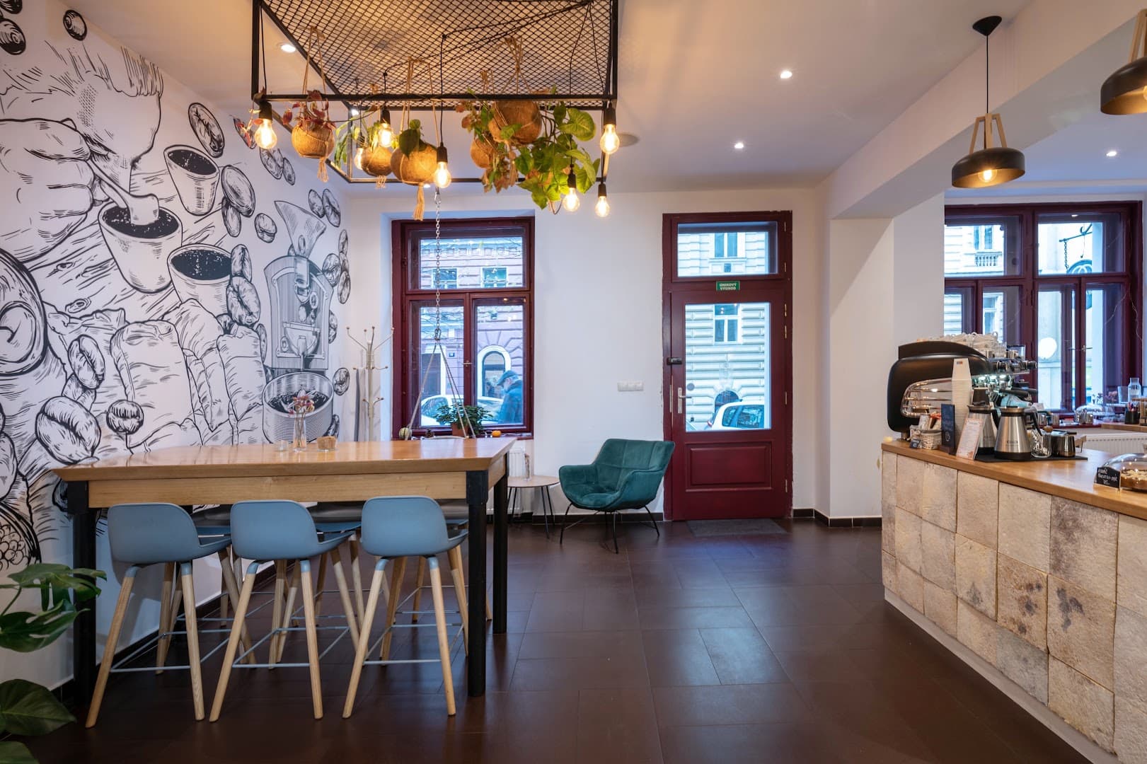 Interior of Dos Mundos Coffee Roastery, specialty coffee shop in Prague