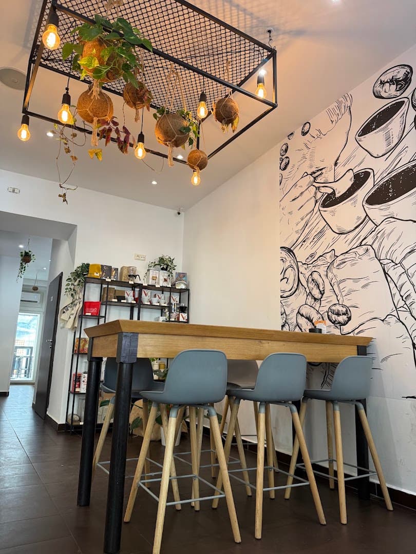 Interior of Dos Mundos Coffee Roastery, specialty coffee shop in Prague